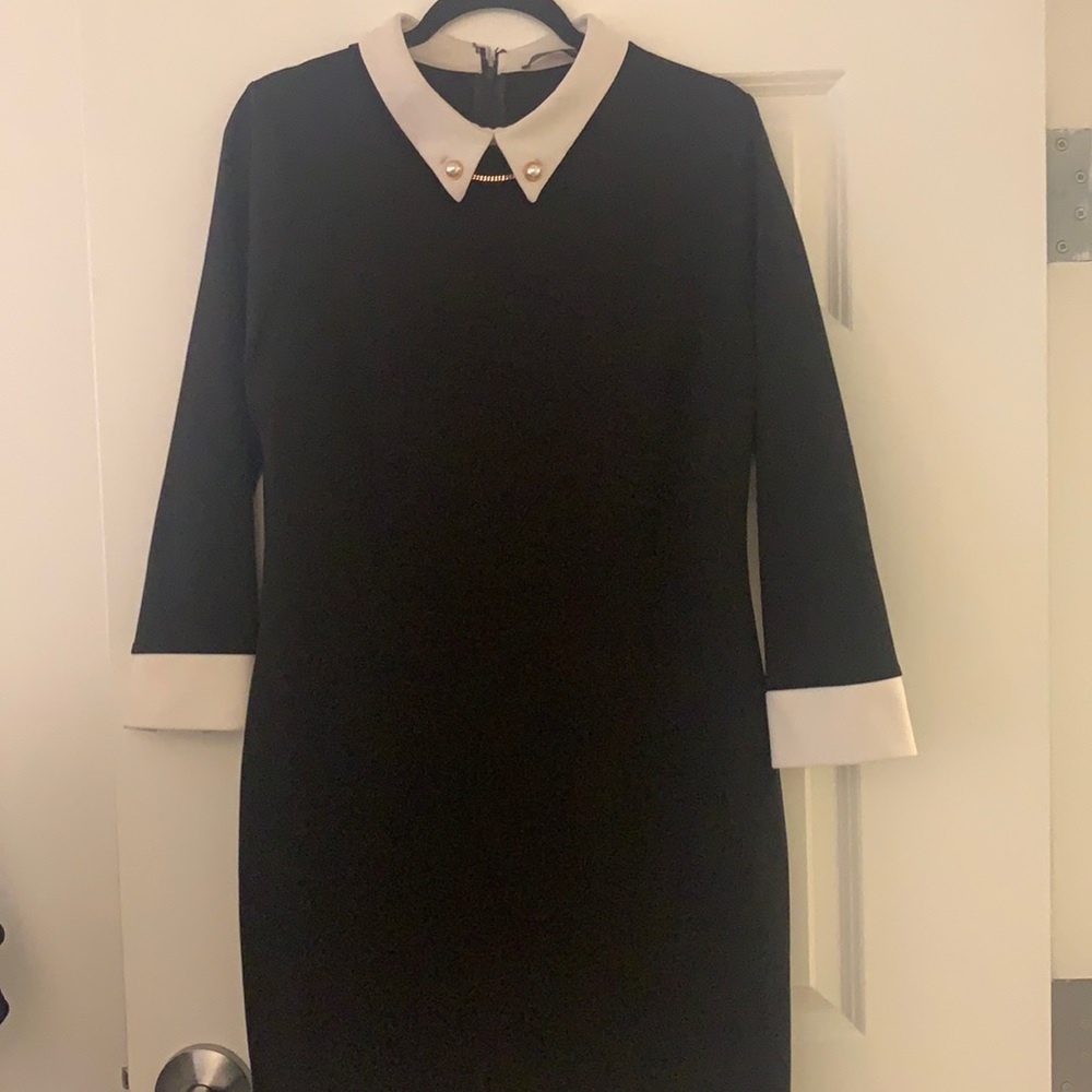 Black and white Ivanka Trump dress with pearls